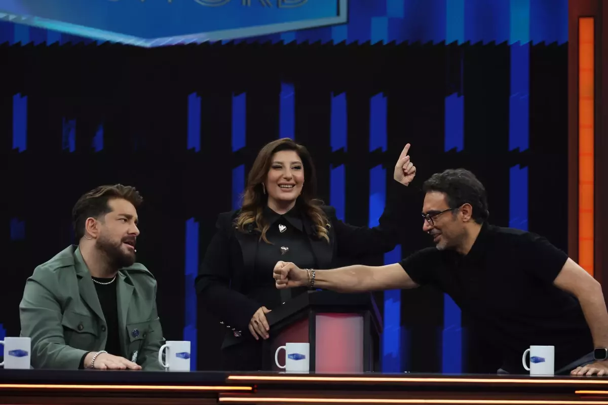 Uğur Aslan'dan Password'da Renkli Performans